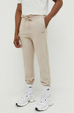 HUGO pantaloni de trening din bumbac culoarea bej, uni 50489617