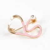 Brosa martisor stetoscop roz