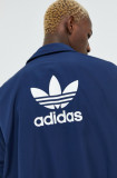 Cumpara ieftin Adidas Originals geaca barbati, culoarea albastru marin, de tranzitie, oversize