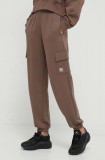 Cumpara ieftin Adidas Originals pantaloni de trening Cargo Jogger culoarea maro, cu imprimeu, IR5909