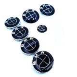 Set 7 embleme BMW, negre full, capota 82 mm, portbagaj 74mm, capace jante aliaj 68mm, sigla volan 44 mm
