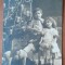 Fotografie tip carte postala, necirculata, copii langa bradul de Craciun, 1924