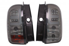 Stopuri LED Negru/Furmuriu compatibile cu Dacia Duster (2010-2017) Linie LED foto