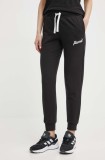 Puma pantaloni de trening culoarea negru, cu imprimeu, 679350