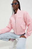 Cumpara ieftin Tommy Jeans geacă bomber femei, culoarea roz, de tranziție DW0DW17240