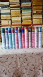 Colectia de romane Reader's Digest - 12 volume - 48 de romane - cartonate - Bernard Cornwell, Jeffrey Archer, Lee Child, Richard Paul Evans