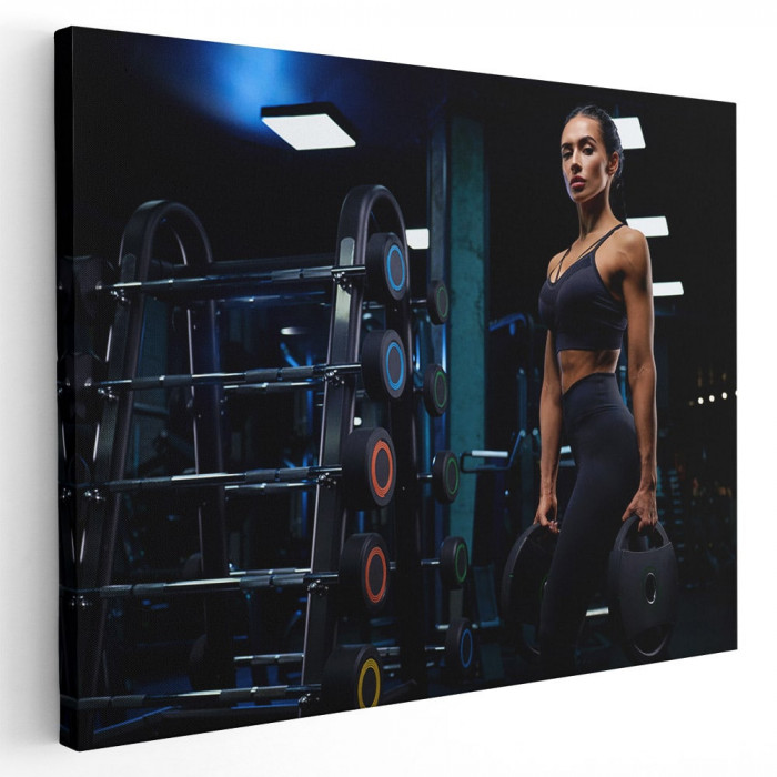 Tablou femeie ridicand greutati sala fitness Tablou canvas pe panza CU RAMA 40x60 cm