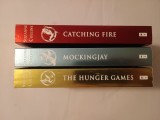 Suzanne Collins - The Hunger Games (Scholastic Children&#039;s Books, 2013; 3 vol.)