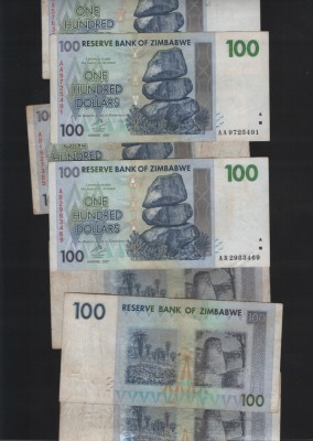 Zimbabwe 100 dollars 2007 F-VF pret pe bucata foto