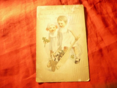 Felicitare - Copii si catelusi circulata 1922 la Bucuresti ,ingalbenita foto