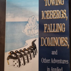 Towing Icebergs, Falling Dominoes, and Other Adventures in Applied Mathematics - Robert B. Banks