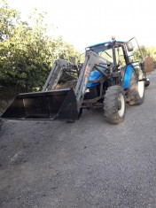 New Holland TL100 foto