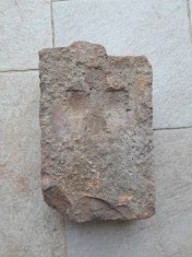 Caramida veche cu cruce provenind de la casa lui A. C. Cuza, Copou