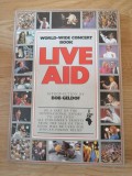 Live Aid: World Wide Concert Book Paperback &ndash; 1985 by Peter Hillmore (Author)