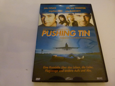Pushing tin -iii-b33, vv foto