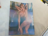 Ilustrată, vedere Striptease. Ilustrată ce &icirc;și schimbă imaginea