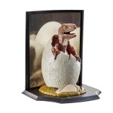 Figurina de colectie Jurassic Park IdeallStore&reg;, Baby Velociraptor, 15 cm, suport inclus