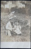 Fotografie tip Carte postala, Barbat turc cu fetita, perioada interbelica