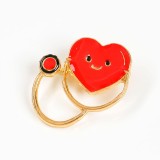 Brosa martisor stetoscop auriu cu inima rosie