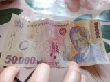 Bancnotă de 50.000 lei din 2001, costă 200 lei.