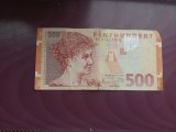 V&acirc;nd bacnota de 500 schilling rulată