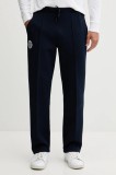 Lacoste pantaloni de trening culoarea bleumarin, uni, XH8982