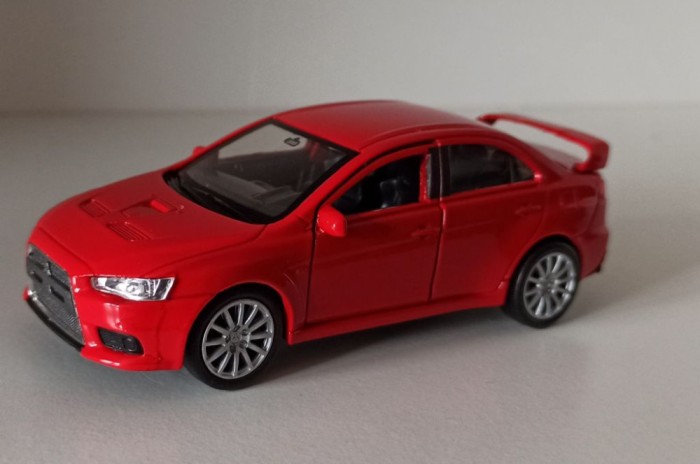 Macheta Mitsubishi Lancer Evo 10 rosu - Welly 1/36